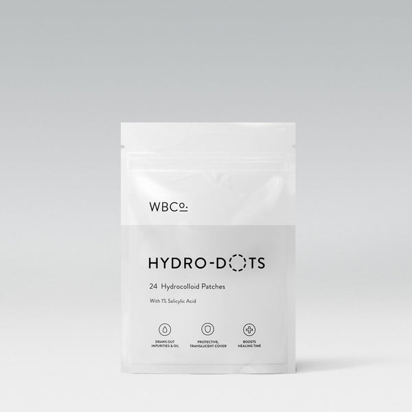 WBco Hydro-Dots 24-patch sheet of hydrocolloid spot patches with 1% salicylic acid, front pack shot