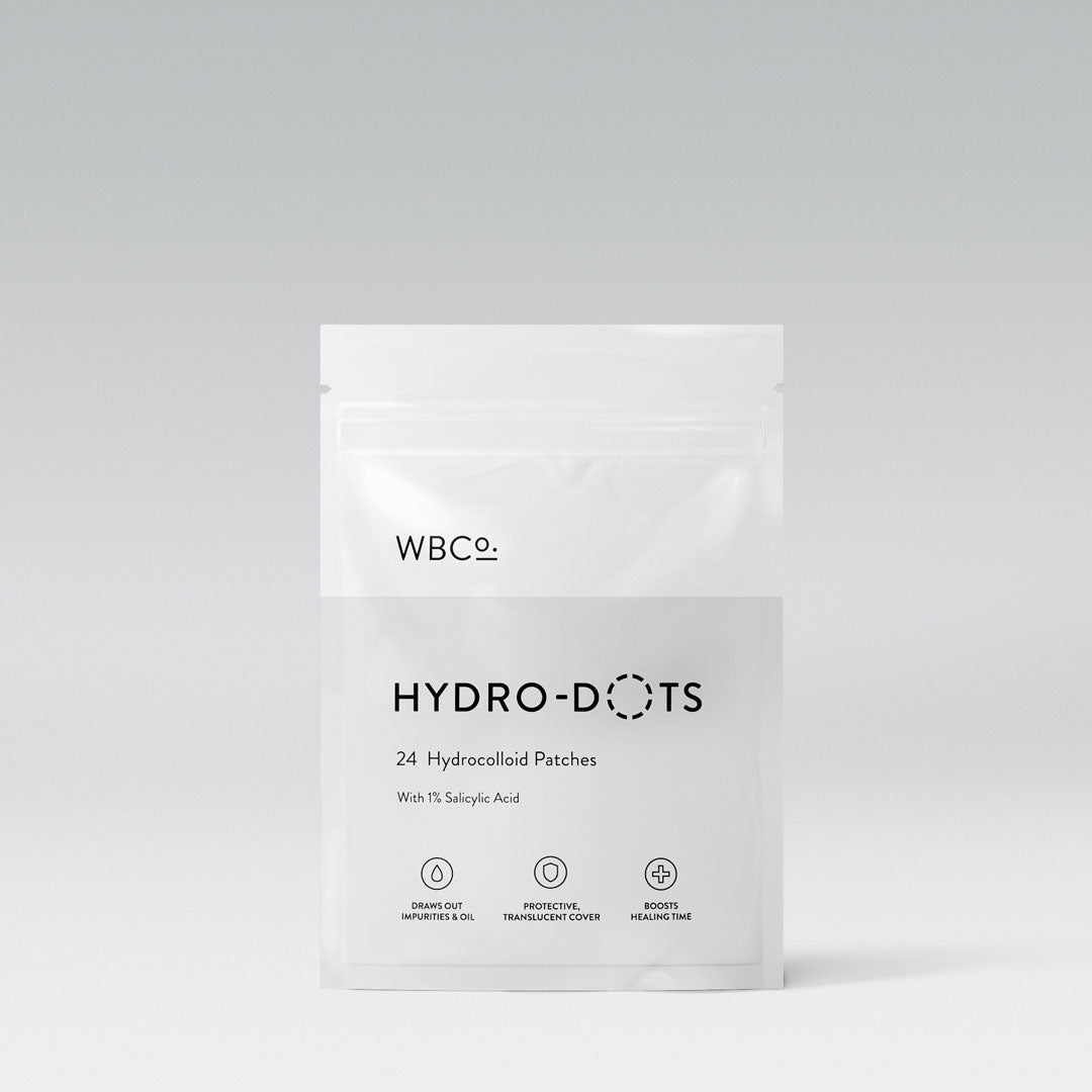 WBco Hydro-Dots 24-patch sheet of hydrocolloid spot patches with 1% salicylic acid, front pack shot