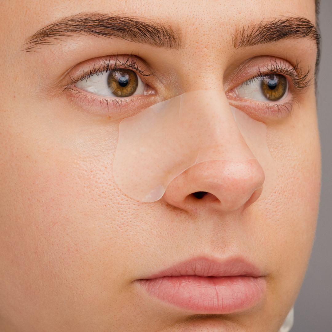 Hydro-Patch peeled from backing film showing the flexible shape designed to fit most nose sizes